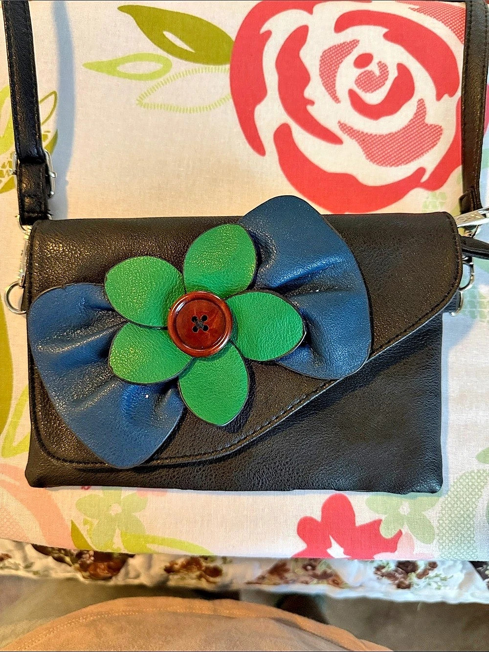 Sax Floral Appliqué Crossbody Bag in Black & Blue leather